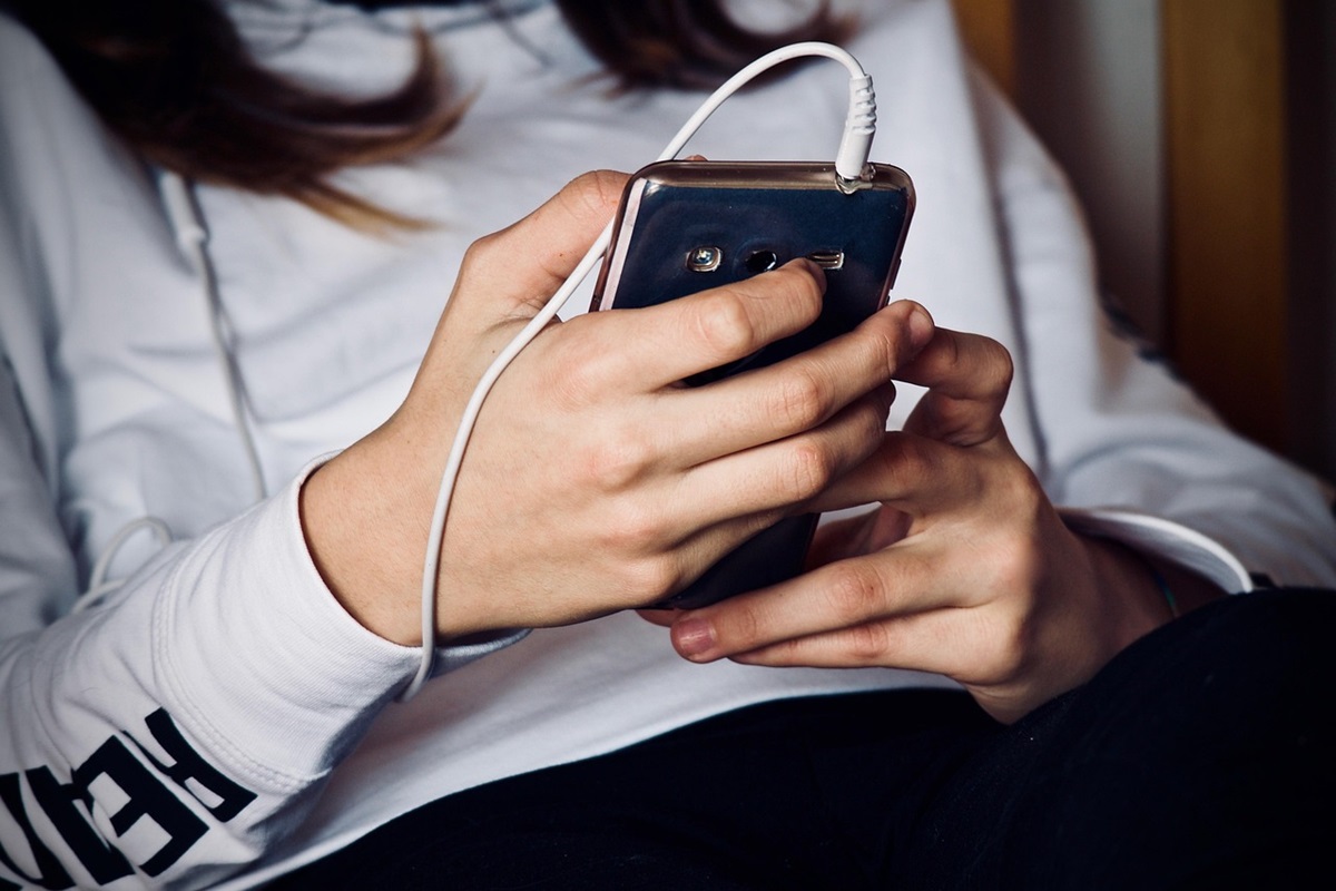 woman checking mobile